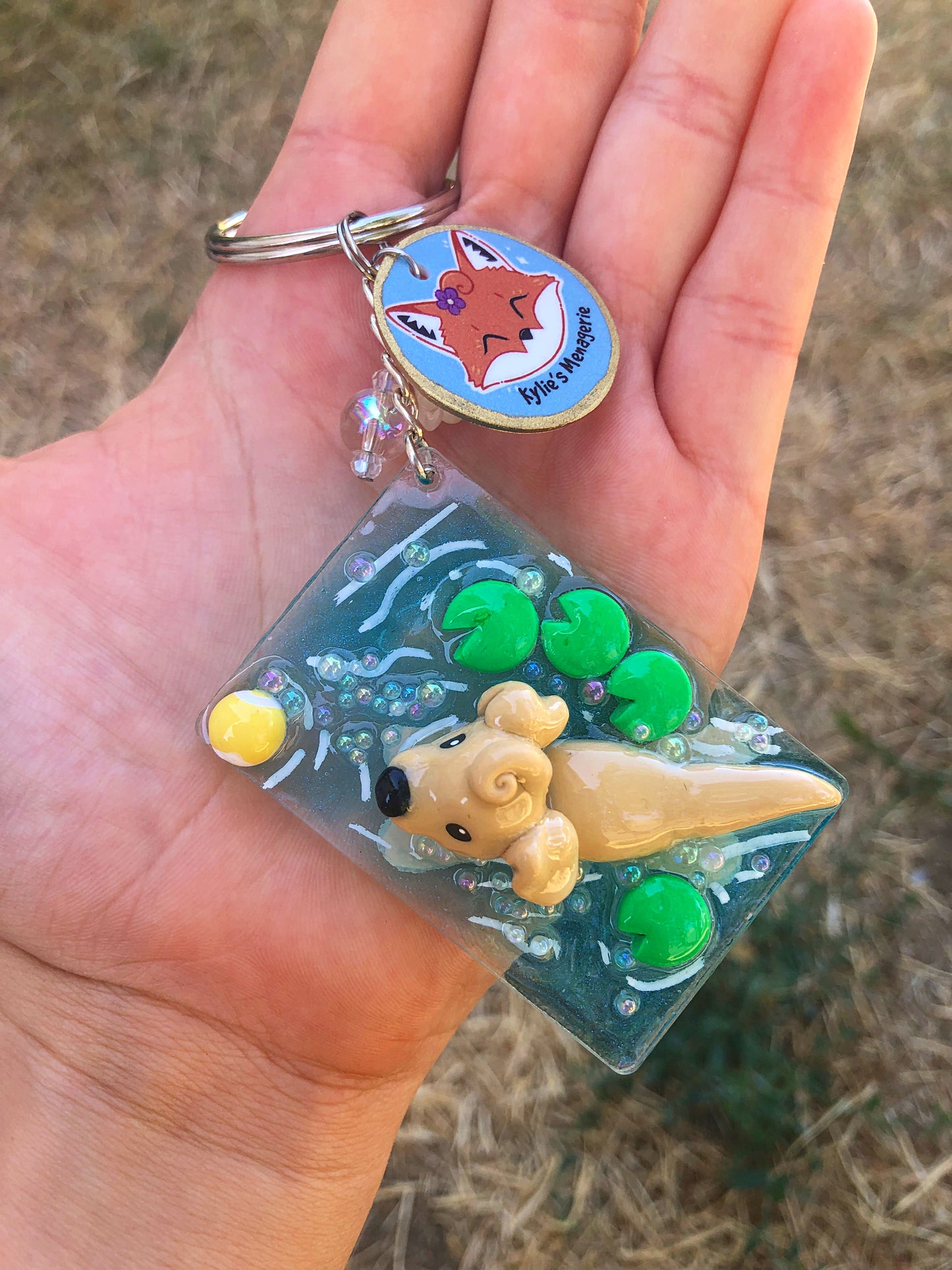 Dog chasing ball polymer clay resin keychain art