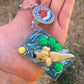 Dog chasing ball polymer clay resin keychain art