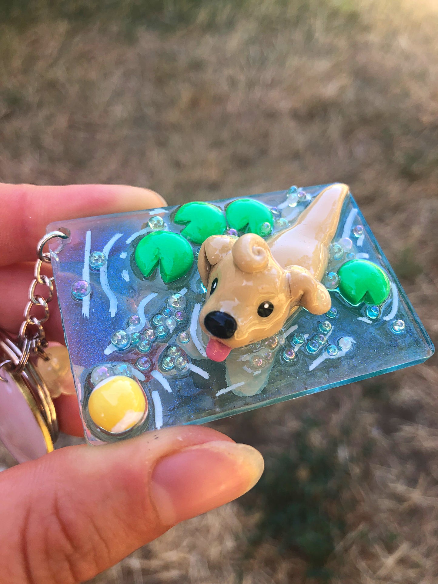Dog chasing ball polymer clay resin keychain art