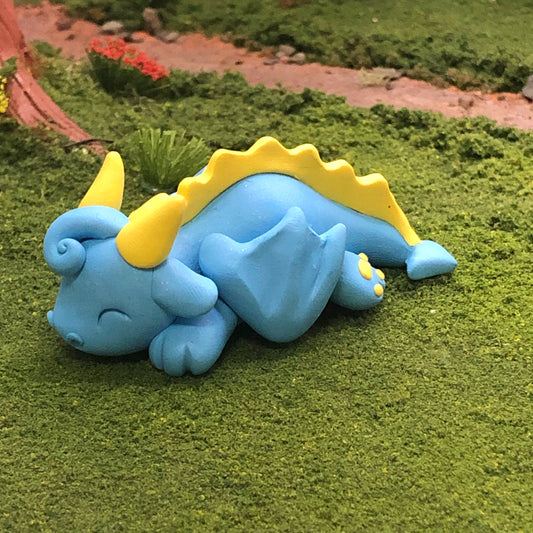 Sleepy blue dragon
